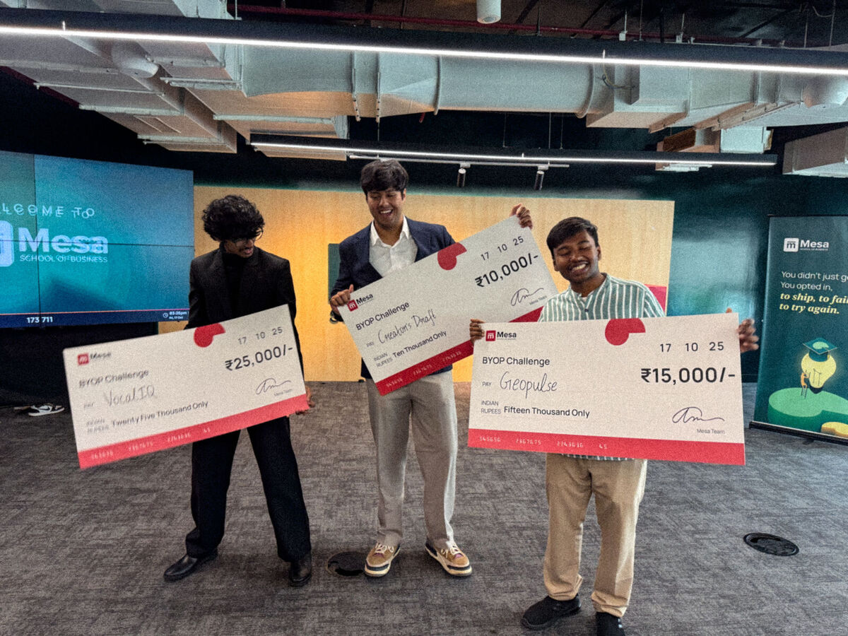 Three BYOP winners holding their prize cheques