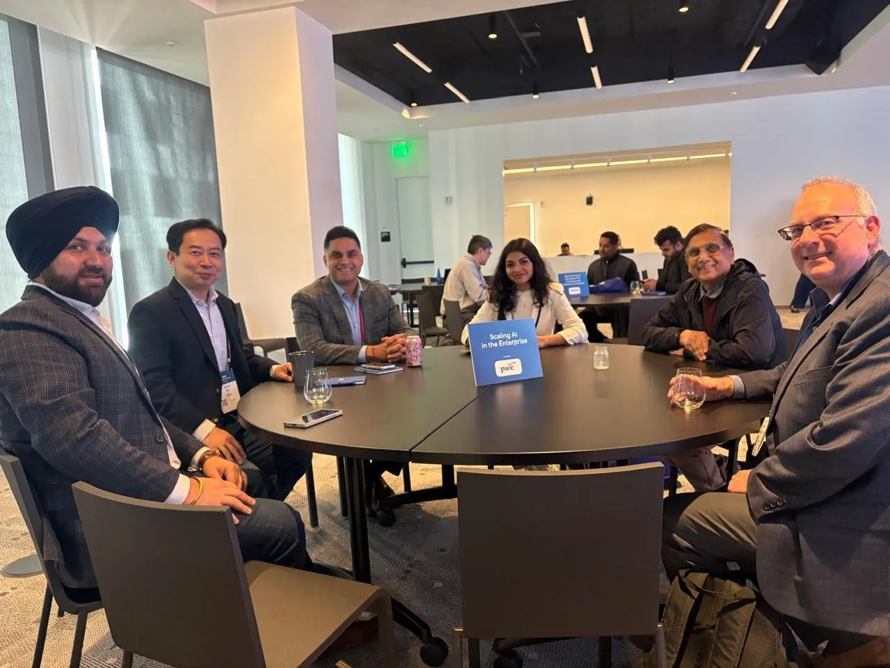 Mesa students at a roundtable with operators during an HQ visit