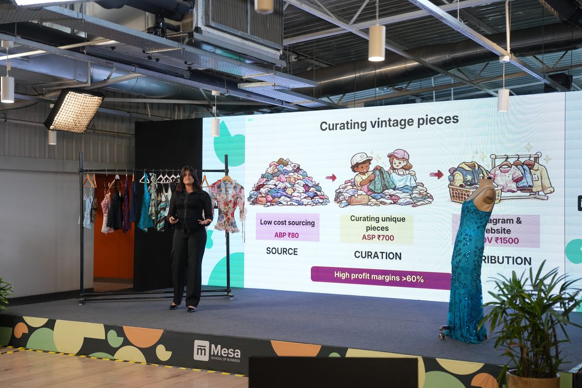 Founder pitching on stage at Demo Day