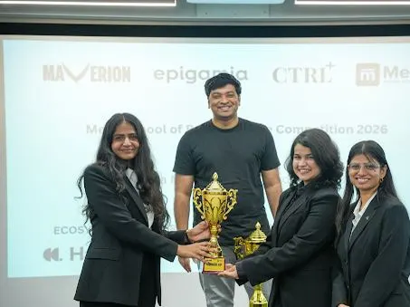 Winners on stage with trophies at the Mesa business competition