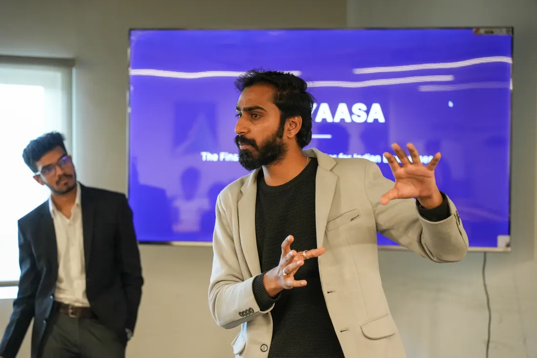 Speaker presenting a growth strategy on stage