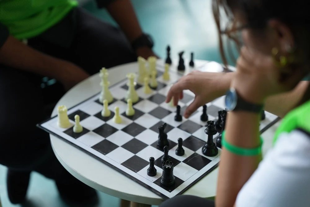 Students playing chess
