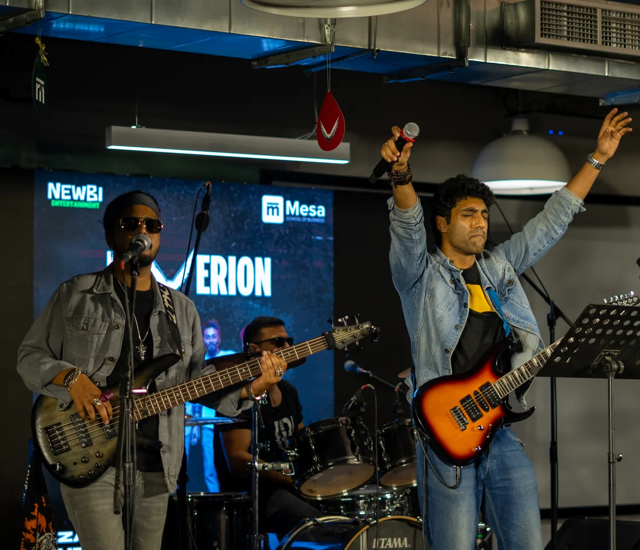 Students performing on stage at Maverion
