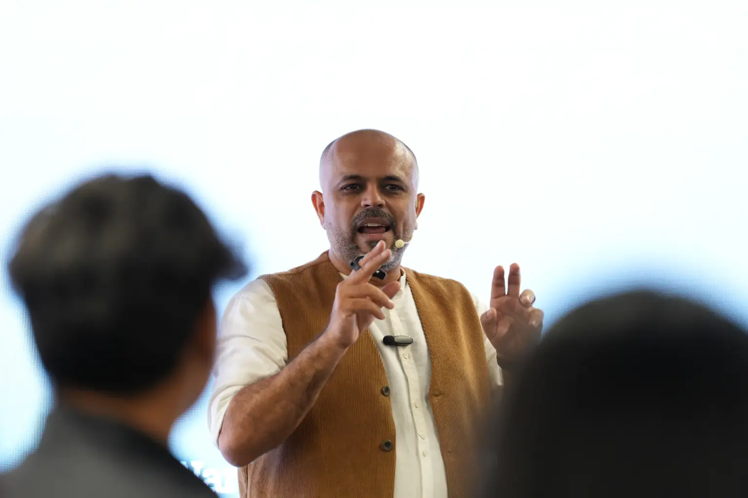 A speaker addressing Mesa School undergraduate students during a session