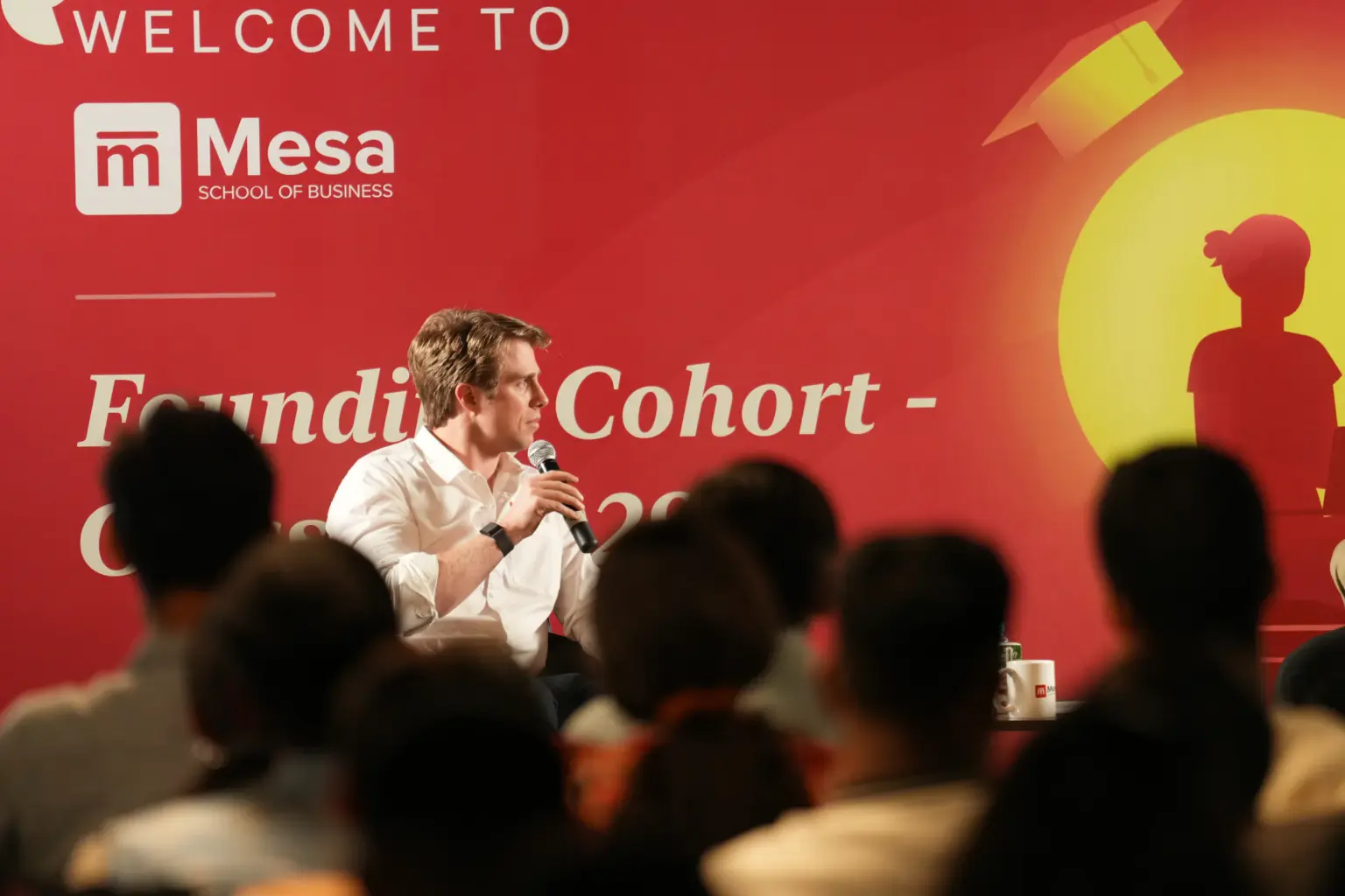 A speaker at the Mesa School of Business founding cohort welcome event
